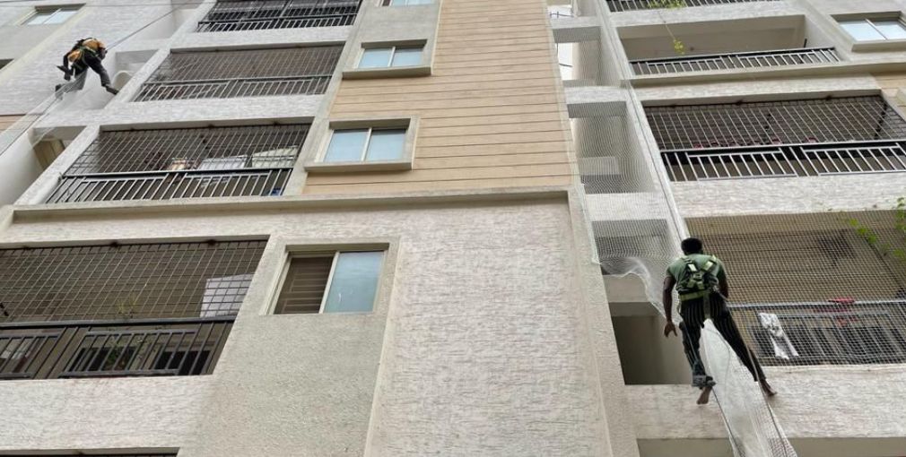 Duct area safety net installation for building protection